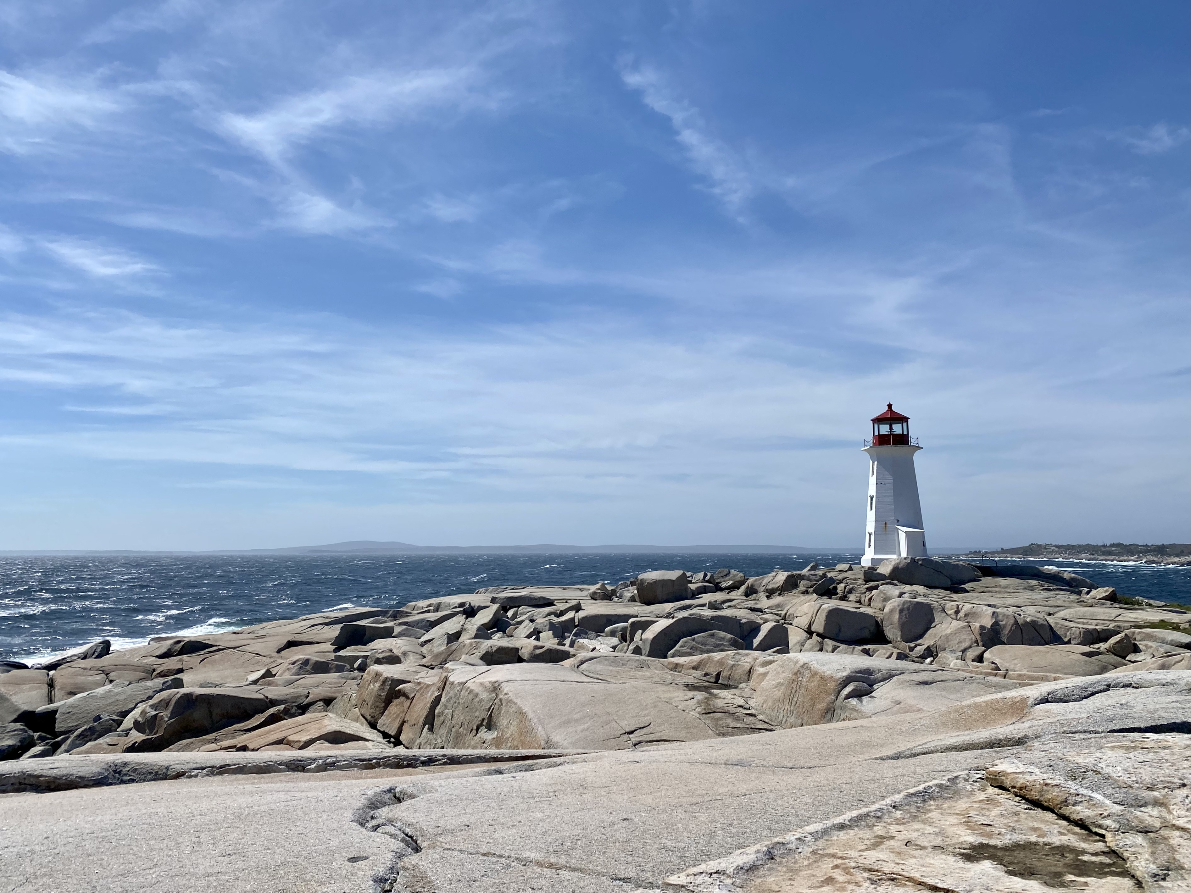 Peggy's Cove Lighthouse on Nova Scotia's rocky Atlantic coastline